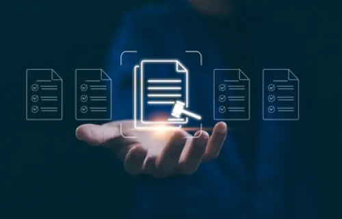 Decorative image, hand holding a form with a gavel