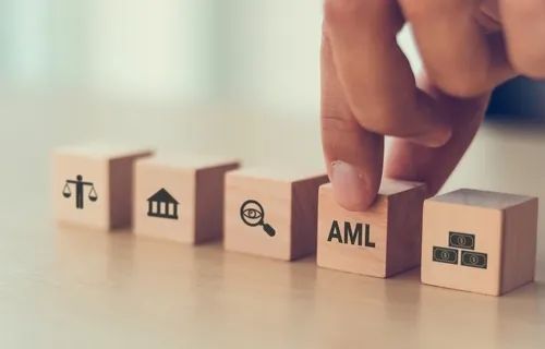 Decorative image: building blocks that say AML